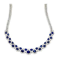 A stunning ladies 18k White Gold Natural Royal Blue Sapphire and Diamond Necklace made in the Province of Alessandra, Italy. The sapphires are Sri Lankan material and custom cut to a perfectly calibrated layout that slightly graduates. The natural round brilliants are collection quality (colorless and VS in clarity). The 16" necklace weighs 60+ grams and contains 303 stones (278 round brilliant diamonds weighing appx 19ct and 25 sapphires weighing appx 18ct). Necklace Blue Stone, Italian Necklace, Royalty Fashion, Boot Jewelry, Colorless Diamond, Royal Jewelry, Necklace Blue, Multi Strand Necklace, Heels Boots