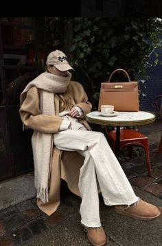 Winter outfit with mini or ultra mini UGGs 🤎 #miniuggs #ultraminiugg #birkin #hermes #acnestudios #camelcoat #woolcoat #coats #ugg #uggboots #boots #winterboots Ugg Ultra Mini Driftwood Outfit, Nyc Winter Outfits, Paris Winter, Nyc Outfits, New York Winter, New York Outfits, Europe Outfits, Winter Outfits Cold, London Outfit