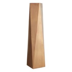 a wooden obelisk on a white background