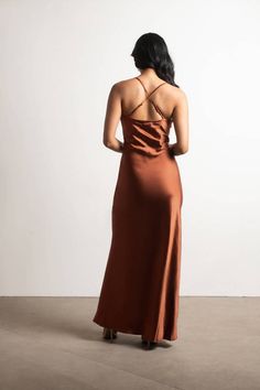 "Flaunt It In The Set The Bar Brown Satin Cami Maxi Dress. With A Form-Fitting Silhouette And Elegant V-Neck Neckline, This Slip Dress Is Perfect For Special Occasions. Delicate Spaghetti Straps And Keyhole Details Add A Touch Of Elegance, While The Front Twist Gives It An Extra Touch Of Sophistication. You'Ll Feel Confident And Beautiful In This Luxe Maxi Dress. Whether You'Re Attending A Formal Event Or Just Dressing Up For Dinner With Your Partner, You Can'T Go Wrong With This Stunner." Cami Maxi Dress, Brown Satin, Satin Cami, Garden Parties, The Bar, Strappy Heels, Feel Confident, Formal Event, Backless Dress