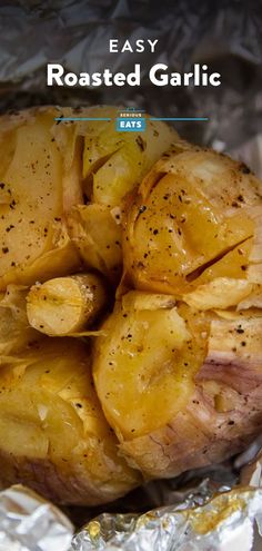 roasted garlic in foil with text overlay that reads easy roasted garlic recipe for potatoes