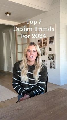 a woman sitting at a table with the words top 7 design trends for 2021 on it