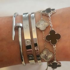 5 Piece Silver Clover Stack Set With Nail Love Slim Love Clover And Black Clover In Stainless Steel Non Tarnishing Hypoallergenic Can Be Worn Everyday Without Tarnishing Diamond Bracelets Stack, Gold And Silver Stacked Bracelets, Gold And Silver Jewelry Stack, Silver Jewelry Combo, Chunky Silver Bracelets, Jewelry Layering Silver, White Silver Jewelry, Silver Stacked Bracelets