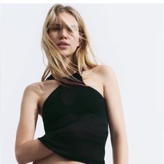 Ribbed Black Halter. Nwt Size Large Runs Big. Very Cute. Sleek Black Halter Top, Sleek Black Tank Top For Party, Black Fitted Sleek Halter Top, Black Sleek Summer Tops, Sleek Fitted Black Halter Top, Sleek Black Fitted Halter Top, Zara Halter Neck Top For Night Out, Sleek Black Sleeveless Halter Top, Sleek Black Halter Top For Night Out