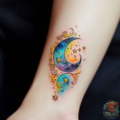 a colorful tattoo on the foot of a woman's left arm with stars and crescent