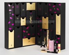 an open black and gold box with lipstick on it