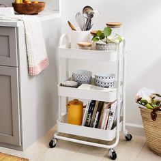 a kitchen cart with various items on it