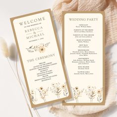 two wedding program cards with flowers on them