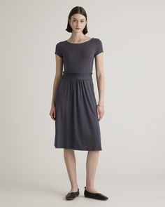 Fitted where you want it, flowy where it feels good. Our Tencel Jersey Ruched Waist Dress is the one-and-done outfit you’ll go to season after season. Eco-cool and all-day comfy, it’s as soft as it is sustainable, and it’s part of our growing knit-dress collection. With hidden side pockets for extra functionality, you’ll definitely say yes to this dress.  | Quince | Women's Tencel Jersey Ruched Waist Dress in Carbon Grey, Size XS Ruched Waist Dress, Say Yes, Waist Dress, Quince, Dress Collection, Knit Dress, Jumpsuit Dress, Size Medium, Grey