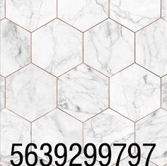 a white and black marble tile with the number 539239077 on it