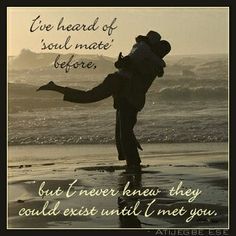 a couple holding each other on the beach with an inspirational quote above them that reads, one heart of soul mate before