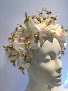 Bee lover- Bee Keeping- Bee Hive- Bee Headband- Bee Keeper- Mad Hatter Party- Tea party- Garden Party- Bee Costume- Kentucky Derby Hello, This Ivory fascinator has 5 rose flowers that are covered with bees and it is about 4 inches wide. It has yellow 1 inch bees buzzing around the flowers. It is attached to a covered skinny headband and is adjustable. It's very comfortable and will fit all ...from 8 to 80! I've been making hair pieces over 20 years. I love what I do and I hope you do too! I ship Bee Hive Hair, Queen Bee Costume, Ivory Fascinator, Flower Headdress, Mad Hatter Party, Bee Costume, Bee Dress, Hat Party, Mad Hatters