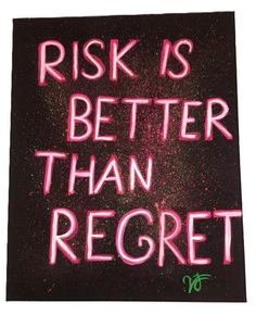 a sign that says,'risk is better than regret'in neon pink letters