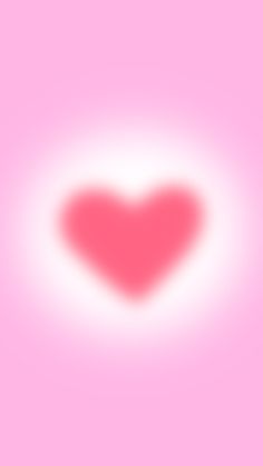 a red heart on a pink background