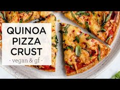 there is a plate with pizza on it and the words quinoa pizza crust