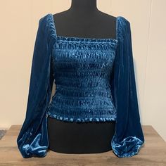 Nwt Size Small Anthropologie Puff Sleeved Blue Velvet Blouse. Cozy Soft Velvet In More Of A Teal Blue With A Stretchy Smocked Body. Blue Fitted Puff Sleeve Top For Fall, Blue Fitted Blouse For Fall, Blue Puff Sleeve Top For Fall, Chic Blue Puff Sleeve Top For Fall, Chic Blue Puff Sleeve Long Top, Fitted Blue Puff Sleeve Top, Blue Padded Blouse With Puff Sleeves, Velvet Top, Blue Velvet Blouse