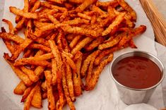 french fries with ketchup and dipping sauce