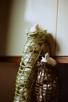 two baskets filled with food sitting next to each other