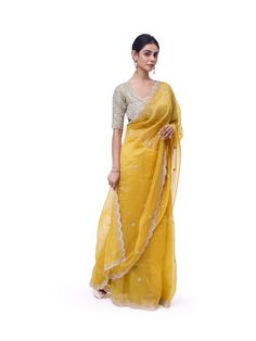 Look like a royalty in this exquisite yellow embroidered organza silk saree at weddings and special occasions. It comes with a beautiful sage green embroidered blouse. Yellow Organza Pre-draped Saree For Reception, Yellow Chanderi Saree For Reception, Yellow Dola Silk Pre-draped Saree For Reception, Yellow Silk Saree For Reception, Yellow Anarkali Style Organza Pre-draped Saree, Yellow Chikankari Embroidery Saree For Reception, Yellow Tissue Silk Traditional Wear For Reception, Yellow Chikankari Embroidered Dupatta For Reception, Yellow Chikankari Embroidery Dupatta For Reception