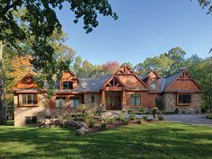 a large house with lots of windows in the front yard