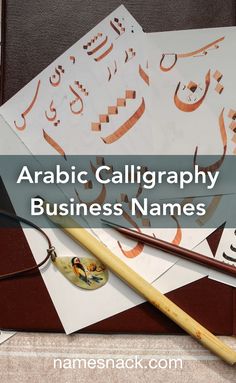 arabic calligraphy business names are displayed on top of some papers with writing in them