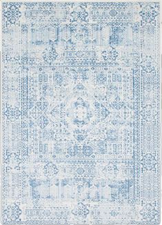 a blue and white rug with an ornate design