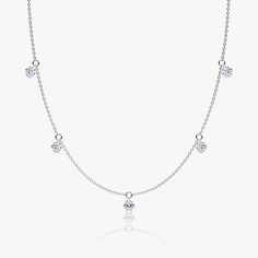 The Floating Station Necklace features a series of ¼ carat Round Brilliant VRAI created diamonds that gently dangle from their pierced-diamond settings. Jewellery Showroom, Floating Necklace, Bespoke Rings, Floating Charms, Diamond Settings, Station Necklace, Three Stone, A Series, Necklace Designs