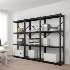 an office shelving unit with several shelves