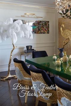 a dining room table with chairs and a chandelier