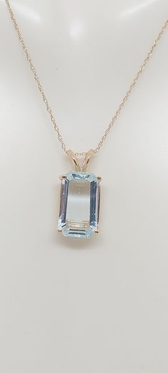 Aquamarine 3.40 Ct Emerald cut 12x8mm 14k Yellow Gold Pendant / Necklace. Natural stone. 14k Yellow gold Rope Chain. Gemstone Jewelry. Aquamarine LOVER. March Birthday Stone. Product Info: - Stone: Aquamarine. - Stone Carat: 3.40 Ct - Stone Measurements: 12x8 mm - Color: Light Blue. - Pendant Measures: 20mm x 8mm. - Metal: 14k Yellow Gold. - Chain Length: 18 inches 14K Yellow Gold Rope Chain. - Made in USA. - Nice Gift Box Included. Jewelry Aquamarine, Birthday Stone, March Birthday, Gold Rope Chains, Aquamarine Pendant, Aquamarine Necklace, Blue Pendant, Aquamarine Stone, Yellow Gold Pendants