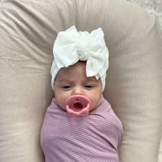 Our Ivory Ribbed Knit Turban Modern Bow hat is the perfect accessory for the stylish  baby girl in your life!   These hat's are made with only the softest, light weight, stretchy material for the perfect comfortable fit.   Enjoy the modern look of the raw edge bow in this adorable turban.  Our hat's come in these sizes: Newborn- fits 0-3 months Infant- fits 3-12 months Toddler- 18 months -4 years Youth- fits 5 year- 9 years *Need a different size just message us! All of our turban hats are handmade with care in the USA. Our turbans are hand sewn and never glued! Our Bow Turbans are SPOT WASH ONLY. Adjustable Soft White Bonnet, Soft Adjustable White Bonnet, White Adjustable Beanie For Babies, White Bonnet Gift, One Size Fits Most, White Bonnet, One Size Fits Most, Gift, White Bonnet Gift (one Size Fits Most), White Beanie Bonnet As A Gift, White Hat One Size Gift