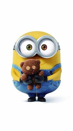 a minion holding a teddy bear in his arms