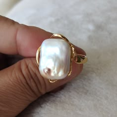 Welcome to my shop my dear friend. I hope you will like my jewelry, and most of my jewelry are made by myself. Please see the detail for this item: Pearl Jewelry: rings material: cultured freshwater pearl Size: adjustable Pearl Color: lavender / white About shipping: I will send out your order in 1-3 business days from China. 1, To United States, will use US E-packet shipping service , usually will 7-15 business days to finish delivery. But the orders should not less than 10$. Hope can get your White Pearl Ring For Jewelry Making, Handmade Open Pearl Ring, Handmade Open Pearl Ring For Wedding, Elegant Handmade Pearl Ring As Gift, Oval Pearl Ring For Gift, Elegant Handmade Pearl Ring For Gift, Handmade Elegant Pearl Ring For Gift, Unique White Pearl Ring, Pearl White Open Ring Pearl Gift