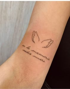 a woman's arm with a tattoo that reads, i am an american eagle and two doves