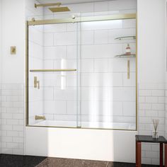 The Sapphire Brushed Gold Sliding Shower Door makes your shower the focal point of the bathroom and provides the ultimate solution for your shower project. Glass is treated with DreamLine exclusive ClearMax water repellant and stain resistant coating for superior protection and easy maintenance. Frame Type: semi-framelessDoor Type: bypass slidingWalk In-Door Opening Height: 57.25Walk In-Door Opening Width: 24 1/4 - 28 1/4Door Installation: reversibleDoor Handle Type: barAdjustable Width: yesGlas Tub With Glass Door Gold, Frosted Glass Window, Shower Spa, Bathroom Tub Shower, Bathtub Doors, Ski House, Sliding Door Handles, Tub Doors, Bathroom Redesign