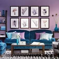 a living room with purple walls and blue furniture