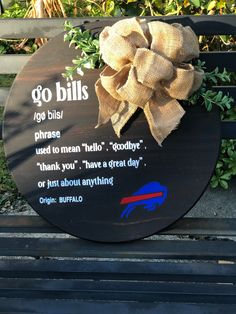 a sign with a bow on it that says go bills