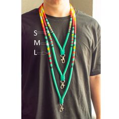 Introducing the Native Style Beaded Turquoise Lanyard, a versatile and ingeniously handmade accessory perfect for teachers, nurses, and anyone who needs to keep their ID or badge close at hand. Crafted with meticulous attention to detail, this lanyard features a stunning blend of turquoise beads and intricate Native American-inspired designs. Designed to be both functional and fashionable, the lanyard offers a convenient way to keep your essential items secure while adding a touch of southwester Beaded Id Lanyard, Native Beaded Lanyards, Beaded Lanyard Native, Cheap Everyday Beaded Lanyards, Beaded Lanyards Native American, Adjustable Blue Beaded Lanyards, Green Beaded Lanyards Native American, Teacher Badge Holder, Lanyard Teacher