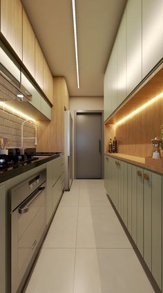 an empty kitchen with white tile flooring and wooden cabinets