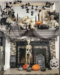 a fireplace decorated for halloween with skeletons, pumpkins and other decorations on the mantle