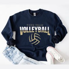 an image of a volleyball sweatshirt and shorts on a white background with sneakers, jeans and converse shoes