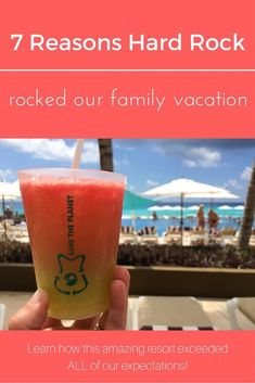 a person holding up a drink with the words 7 reasons hard rock rocked our family vacation