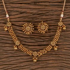 South Indian Bridal Traditional with matte gold plating Necklace Set with Earrings. Temple choker set. Gorgeous 24 K gold plated. This Necklace set comes in a beautiful gift box, making it an ideal gift for birthdays, weddings or anniversaries. Occasion: Perfect choice for any Indian occasion. Care: It is advisable that you keep products away from direct heat, humidity, and moisture. It is best to preserve your jewelry in the bag/box provided with the package. 100% Satisfaction Guarantee, Highes Gold Necklace Set Indian, Guttapusalu Necklace, Matte Gold Necklace, Temple Necklace, Necklace Closure, Indian Choker Necklace, Jewelry Kundan, Gold Necklace Indian, Necklace Set Indian