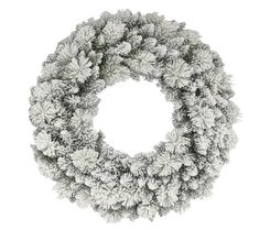 a wreath with snow flakes hanging from it's sides on a white background