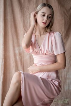 Tea-length Satin Wedding Dress, Feminine Bridesmaid Midi Dress With Ruffles, Satin V-neck Dress With Pleated Sleeves, Feminine Summer Evening Dress With Pleated Bodice, Formal Pink Satin Midi Dress, Pink V-neck Midi Dress For Wedding Guest, Feminine Fitted Tea Length Dress For Formal Occasions, Elegant Satin Dress For Wedding Guest, Elegant Wedding Guest Dress With Ruched Bodice