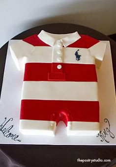 a cake that is shaped like a polo shirt