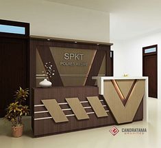 the reception desk is designed to look like it has been cut out from cardboard and placed in front of an open door