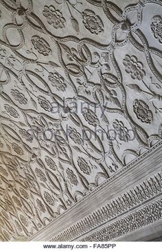 an intricately designed ceiling in the building