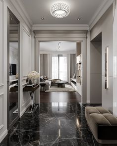 an elegant living room with marble floors and white walls