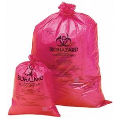 two pink bags with biohazard logo on the front and one bag in the back